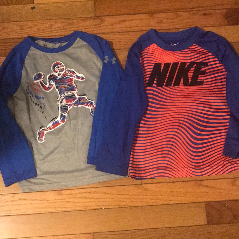 One Under armor shirt and one Nike shirt